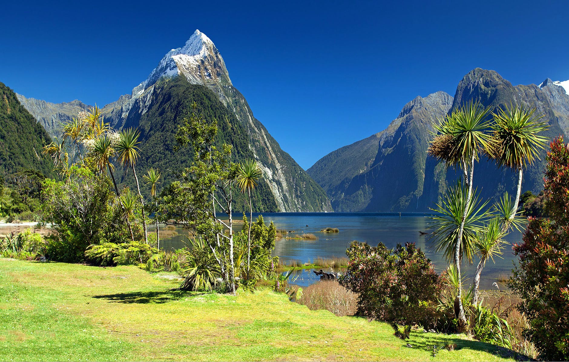 landscape photograph of lake and mountains