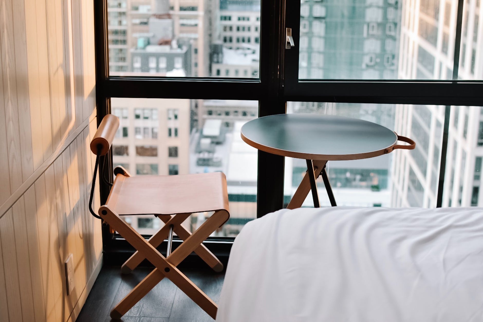 brown wooden chair beside table