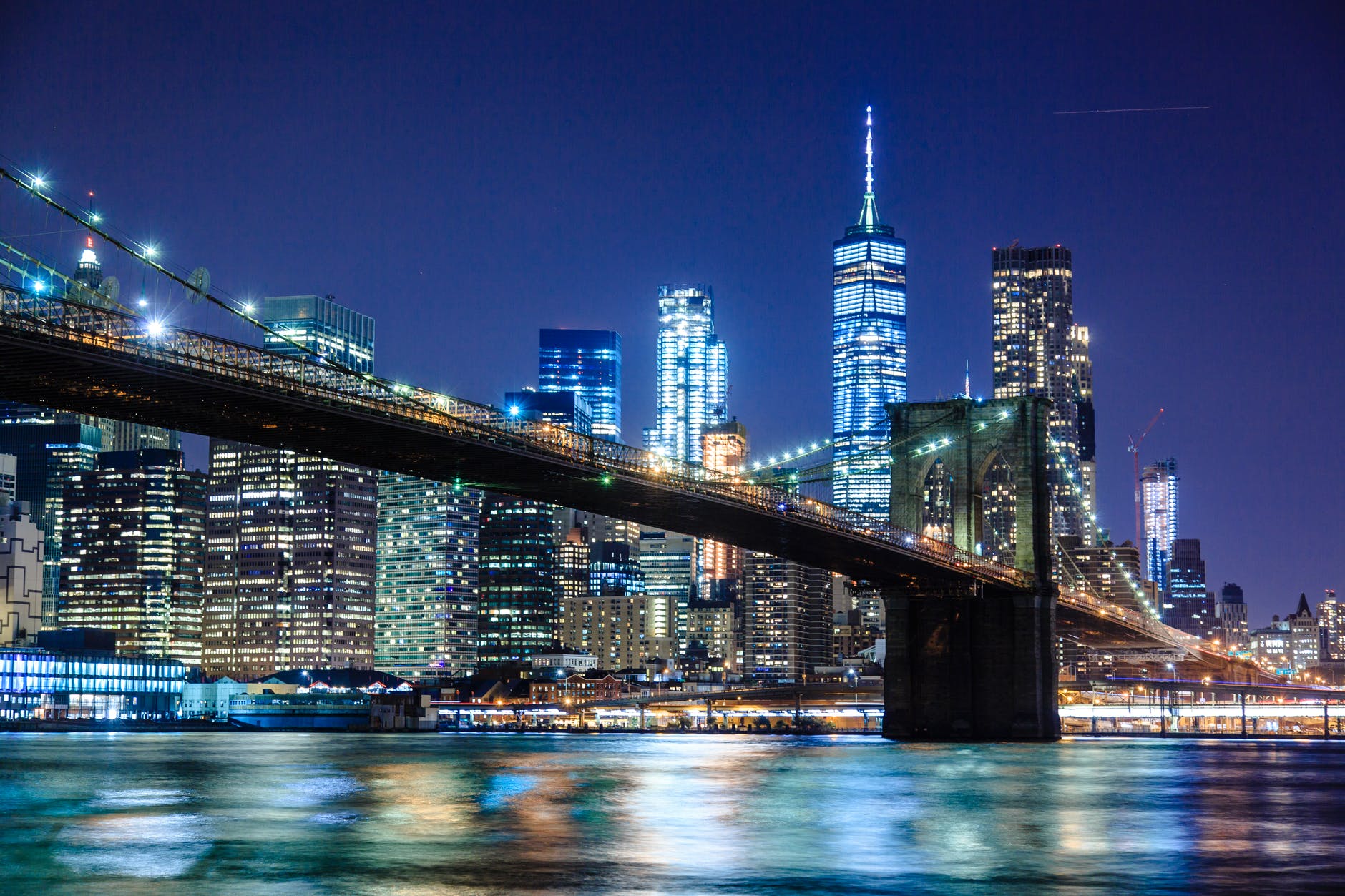 photography of bridge during nighttime